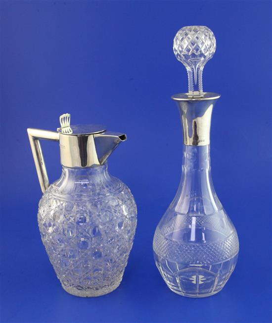 A late Victorian silver mounted and hobnail cut glass claret jug and a silver top glass decanter